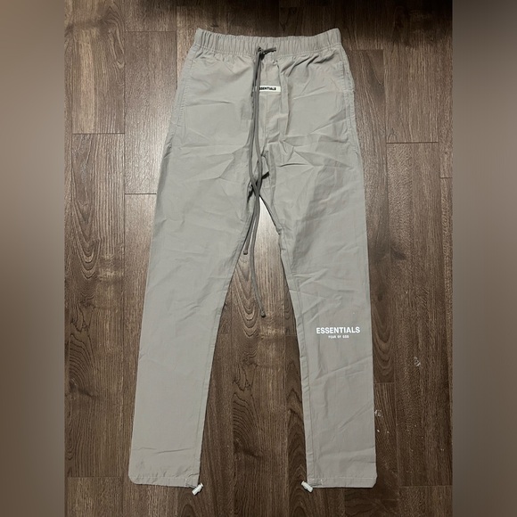 Fear of God ESSENTIALS Nylon Track Pants - Picture 1 of 2